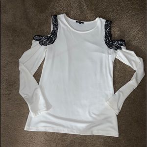 White sweater with lace shoulders